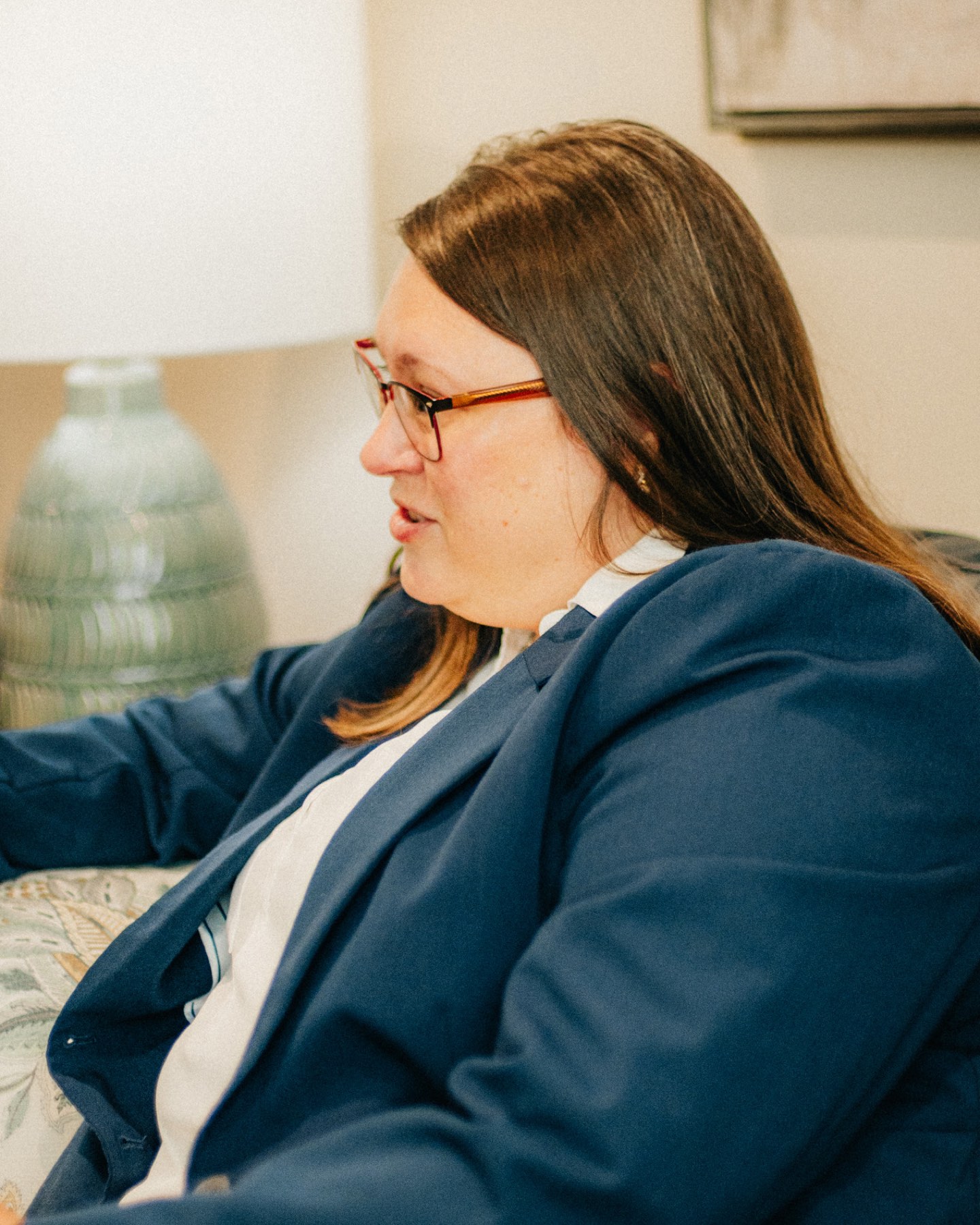 A provider talking with a client in her counseling room